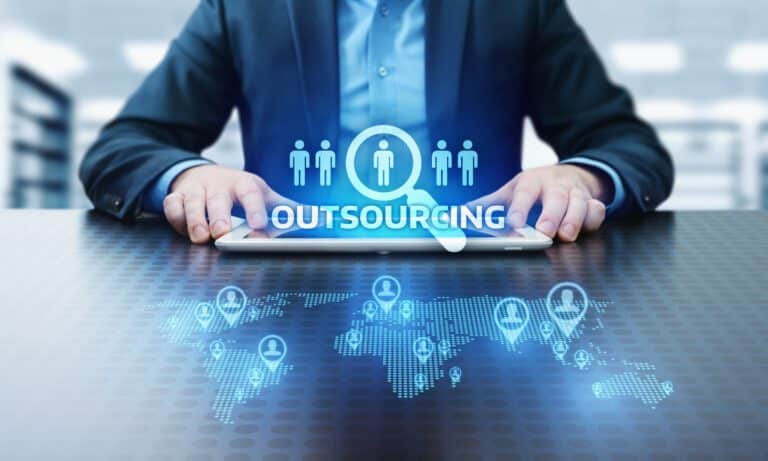 The image shows a hologram of choosing between outsourced IT services.