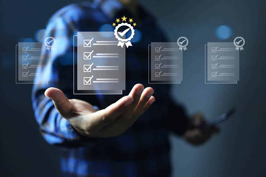 hand get approved IT certification with check mark on the document means that it has been certified to a quality standard or has passed an audit according to industry standards