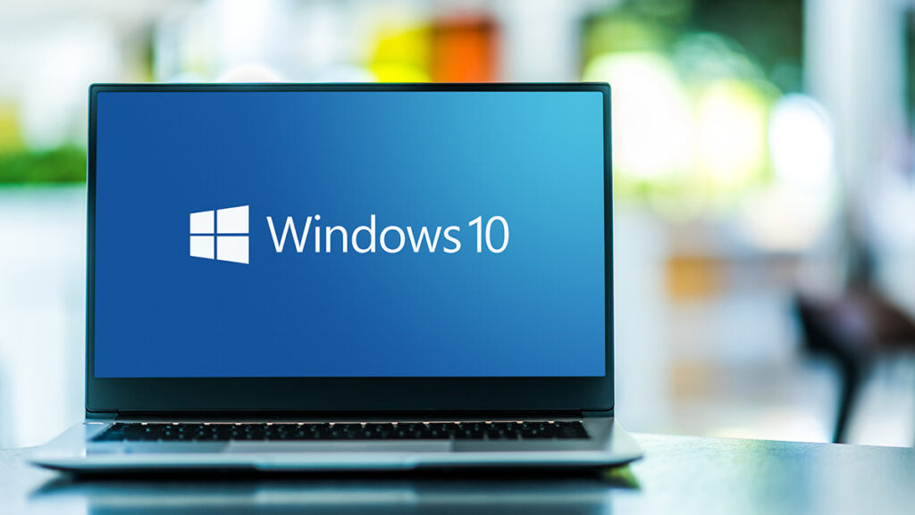 POZNAN, POL - MAR 15, 2021: Laptop computer displaying logo of Windows 10, a graphical operating system, developed, marketed and sold by Microsoft