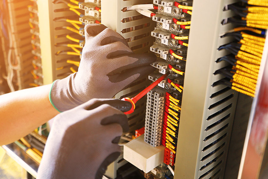 Electrical terminal in junction box and service by technician. E