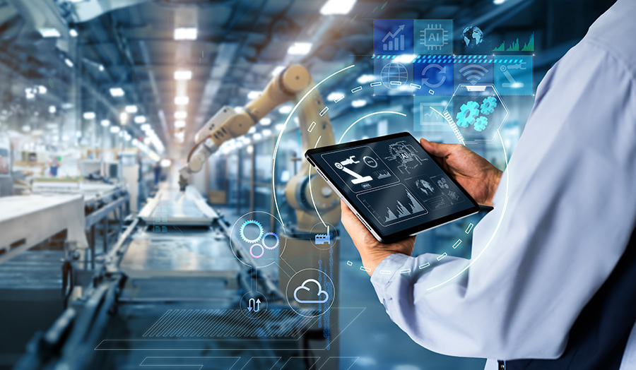 Smart industry control concept.Hands holding tablet on blurred automation machine as background. Smart industry control concept.Hands holding tablet on blurred a